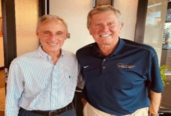 Ron Farb, co-founder and co-executive director, Climb for Cancer Foundation and member of Sunrise Rotary with the Steve Spurrier, owner, Visors Rooftop. 