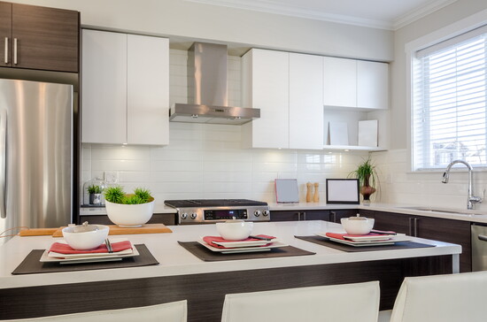 Eating at the island is convenient, but the table is more fun. 