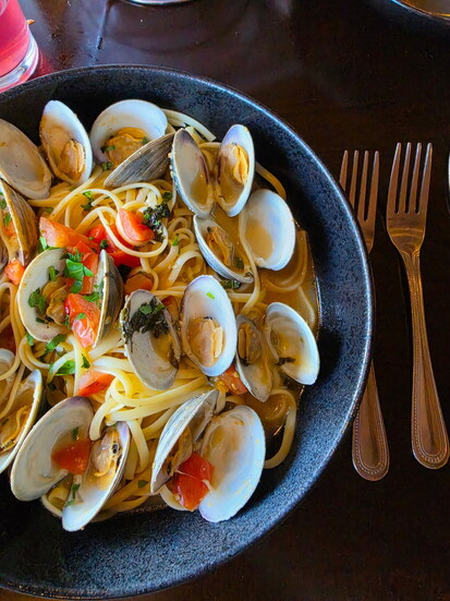 Fresh linguini tossed with tender clams, garlic, white wine and parsley: a timeless Italian favorite done the Piccolo way.