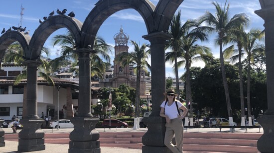 The gate on the Malecón in Puerto Vallarta with Our Lady of Guadalupe Church in framed in the center.