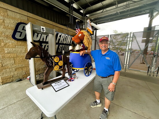 Ken Molzer with mascot SNOIL at Hops for Harmony