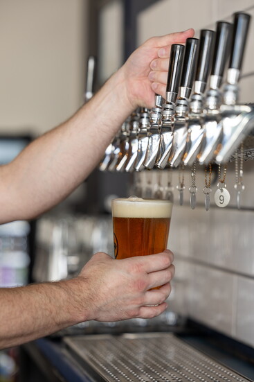 Taps and beer. Photo Credit: Kerry Paradis Photography