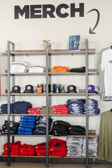 Merchandise on shelves at Watchtower Brewing. Photo Credit: Kerry Paradis Photography