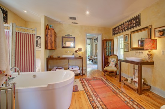 Modern amenities in the master bath are accompanied by inlaid mosaics from Montepulciano.