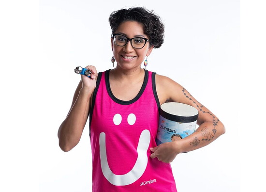 A Creator Day portrait shows how business owners can pair personality, props, and professional studio lighting to create brand-ready content.