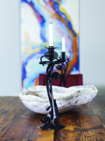 Dining area’s metal-sculpted candlestick: By New York sculptor Albert Paley