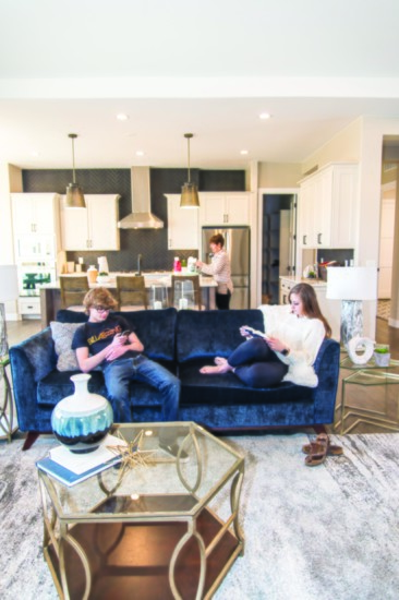 + Matte black herringbone backsplash anchors this open floorplan single-level living space.