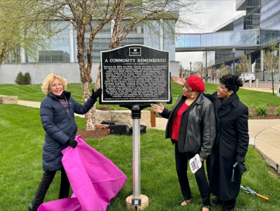 Clayton Mayor Michelle Harris (left) unveils “A Community Remembered” marker with Dr. Doris Graham (center) and Carmen Hill. / Photo by Bob Denlow 