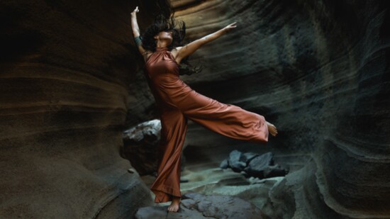 Dancing in a cave in Gran Canaria, Spain. Vintage handmade jumper by Lindsey's grandmother in the 1960s.