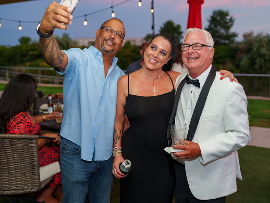 Rick Crowne and guests enjoying the D.C. Prime Anniversary Celebration.