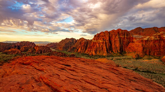 Snow Canyon State Park pairs dramatic red cliffs with ancient black lava flows. Photo by Larry.