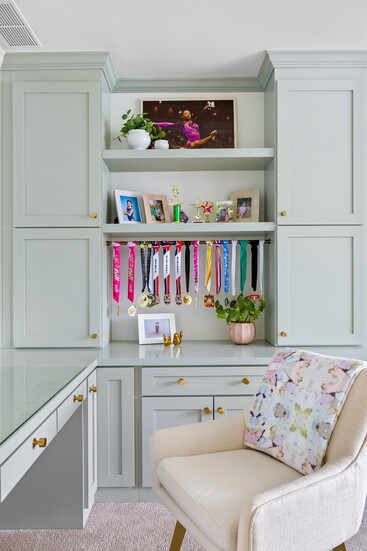 A custom-built desk makes crafting a breeze, but not a mess. Congrats to the superstar gymnast who earned these medals!