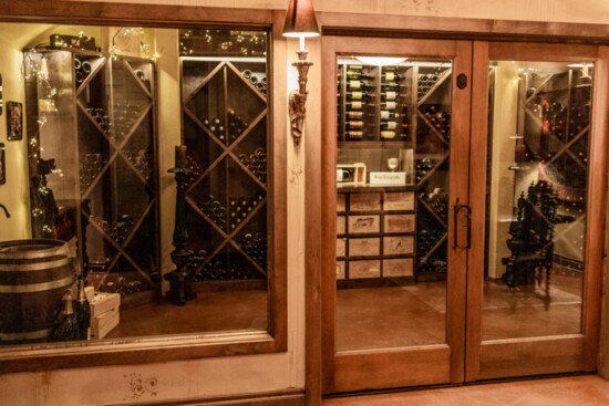 The basement features a custom alderwood wine cellar.