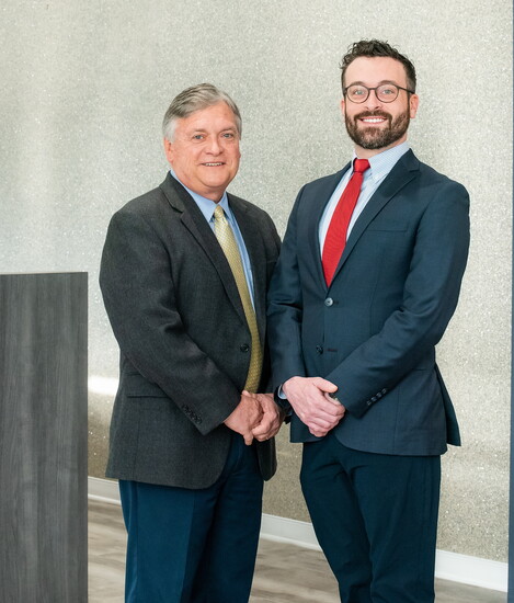 Dr. Spencer Boozer, right, with his father, Dr. R. Bryan Boozer