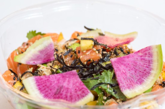Hau'oili Salmon: Yuzu ponzu, mango, green onion, cilantro, watermelon radish, edamame, crispy shallot