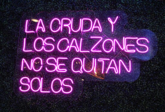 This neon sign at Cruda Mariscos and Oyster Bar is the ultimate photo op during a night out.