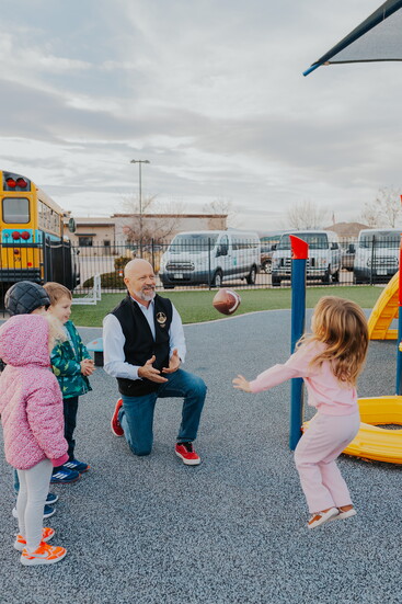 Senator Scott Bright, third-generation owner of ABC Child Development Centers, sharing moments of play, connection, and trust with the next generation.