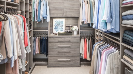 Step inside the walk-in closet where his and her belongings are intuitively arranged
