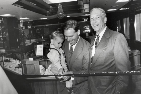 Alvin, Marc and Matthew Fink at the store's ribbon cutting