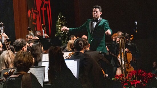 Leading the orchestra is Venice Symphony's Music Director/Conductor Troy Quinn.