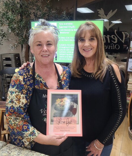 Venice Olive Oil's Marci Weidemiller (l) with VCL Publisher Charmaine Tincher.