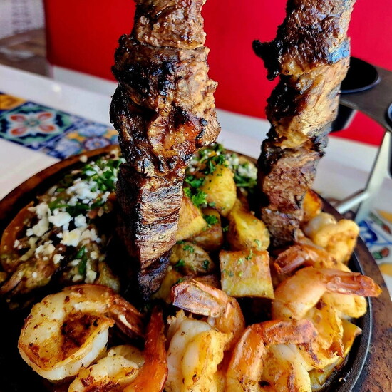 Camila’s Tex-Mexi-Que – Tex-Mex skewers with shrimp, steak, potatoes, and bold flavors.