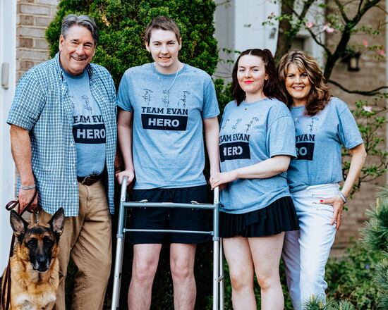Photo by Bonnie Phillips; Evan with his family