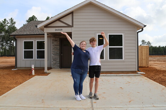 Elizabeth and her son are overjoyed with their new home.