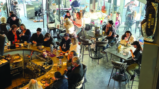 Guests gather at Watch Me! Sports Bar, where fans come together to celebrate women’s sports.