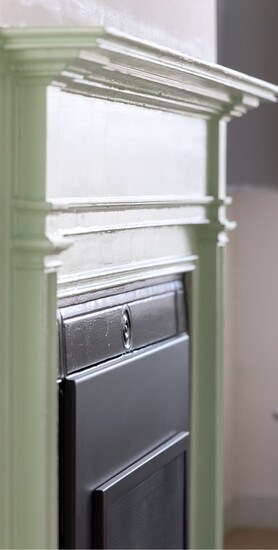 Original fireplace (converted to gas). Photo by Kevin Edge