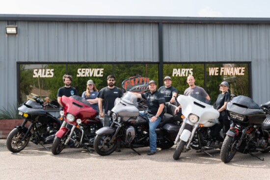 Staff pose on a Harley 