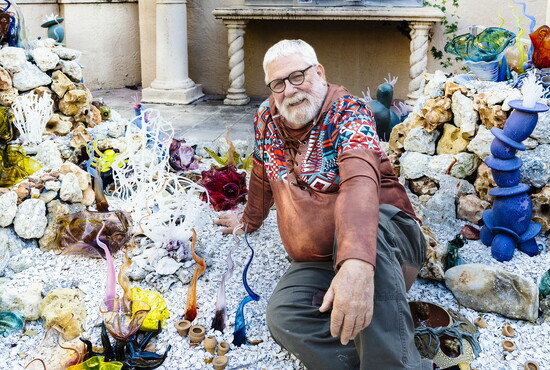 Artist Alan Keck poses with his creation.