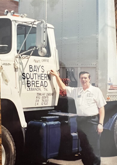 Charlie Bay with the company's first delivery truck
