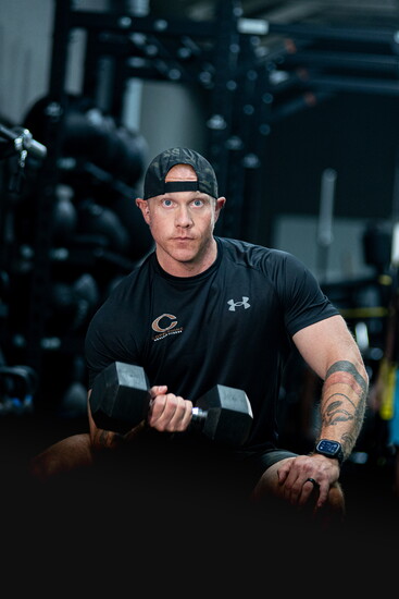 Man working out at Coppermine. Photo Credit: Leah Rhianne for Coppermine