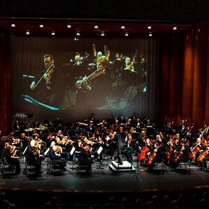 full%20orchestra%20with%20video%20backdrop-300?v=1