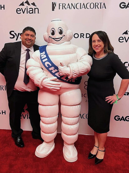 BOTB's Thomas and Elizabeth Bille pose with Bibendum, aka the Michelin Man. 