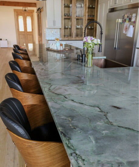 Green countertops are redefining kitchen design with a fresh mix of warmth, elegance and personality.