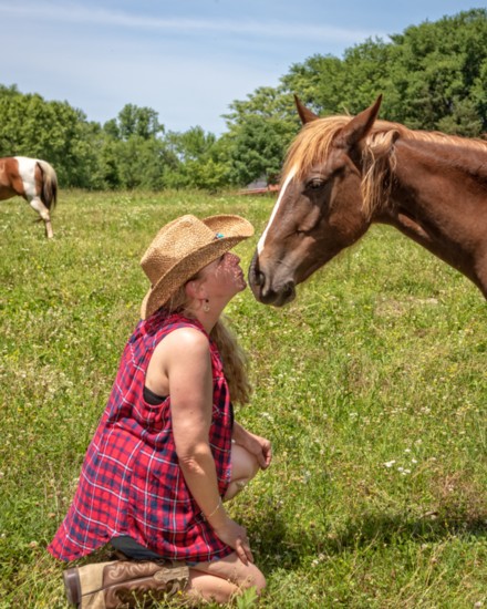 Rachel McAuley provides tender, loving care for her horses.