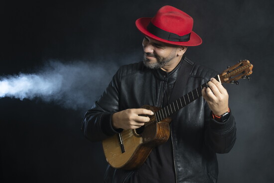 Jorge Glem, venezolano cuatro player featured in "Latin Sizzle"