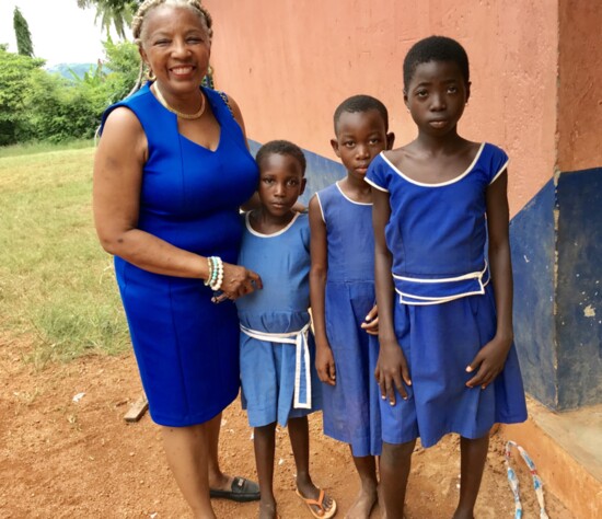 Adrienne Johnson with elementary school girls in the Prampram village.