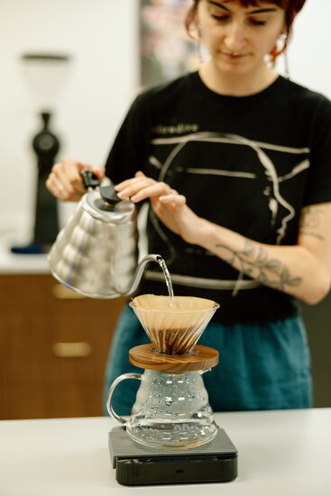 Dolce Belcourt uses the pour-over method to make coffee