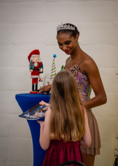 The Sugar Plum tea allows little guest to meet the dancers and get autographs