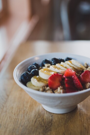 Healthy bowls with fruit and granola are made even tastier with the addition of Broadus Bee's Wildflower Honey. 