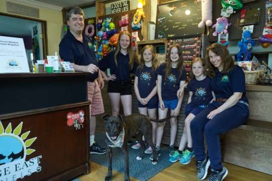 Owners Joe and Laura Kaddis and their four girls hang out by the reception desk and retail selection. Slate, the rescue pit bull, serves as Chief Greeter. 