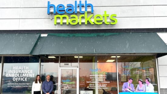 Michelle Bye and Kurt Delfin outside HealthMarkets.