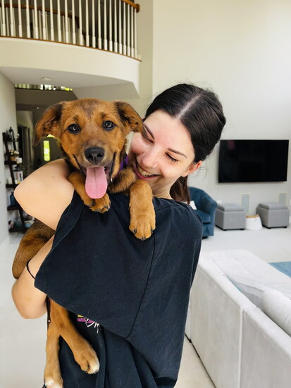 Leesburg Lifestyle publisher Doug Steele's family adopted Marley (shown with Elizabeth Overton) from Canines & Kitties. Photo: Heather Steele