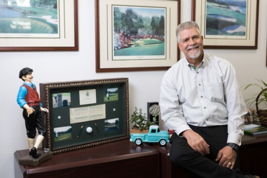 Dave Listul in his office amid  memorabilia from the Atlanta Athletic Club