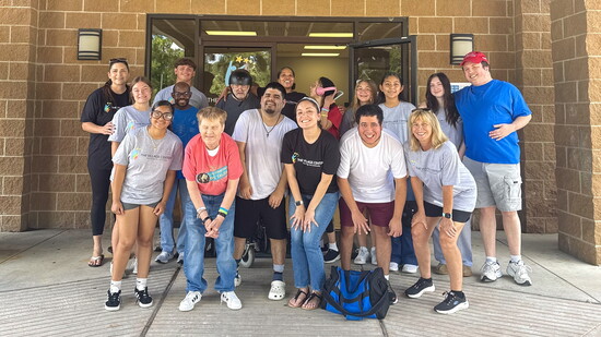 Staff, Villagers, and volunteers celebrating The Village Centers' Family Picnic event.