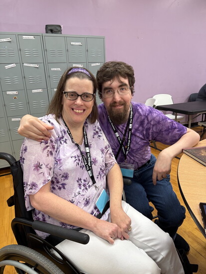 Jessica and Aaron, longtime Villagers and the sweetest couple, pose together on Wear Purple Day.