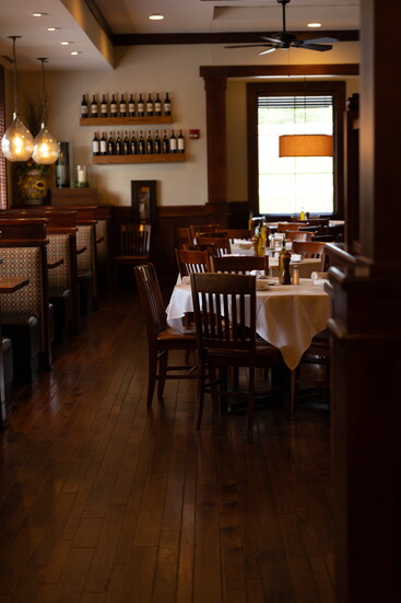 Warm wood, Italian decor and a crackling fireplace create a cozy, welcoming place to gather.